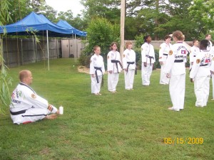 Black Belt Candlelight Ceremony - Black Belts Prepare to Sit