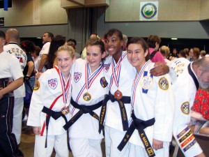 Ms. Britney Johnson (Center) and the other Top Sparring girls in the 2nd Degree, Girls 11-12-13