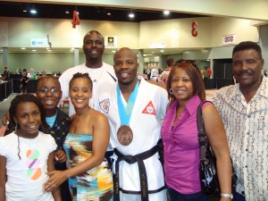 Mr. Validores Wins 3rd Place Sparring at World Championship Mr. Validores Poses with Family after Winning 3rd Place Sparring at World Championship